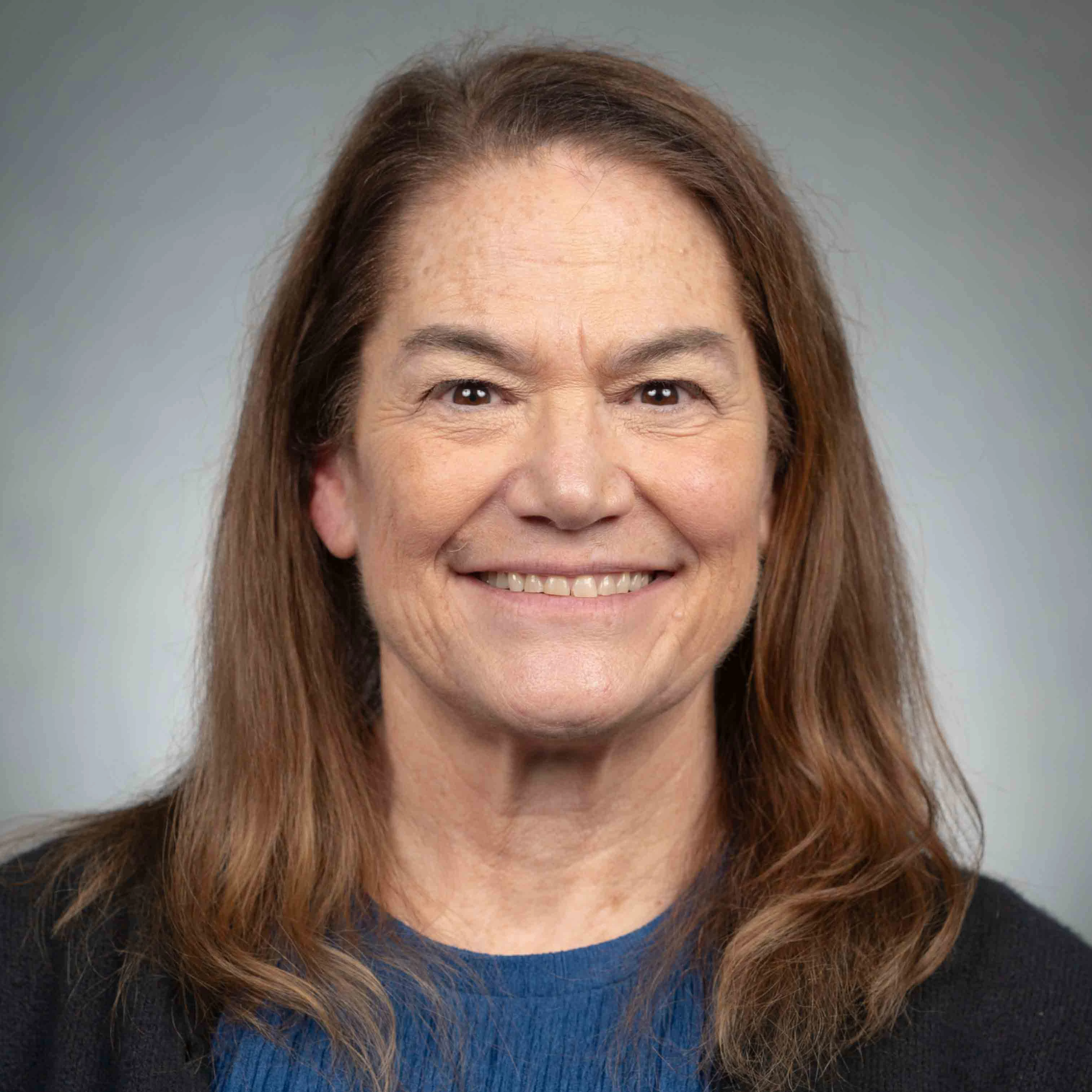 Headshot image of Dr. Faith Wells